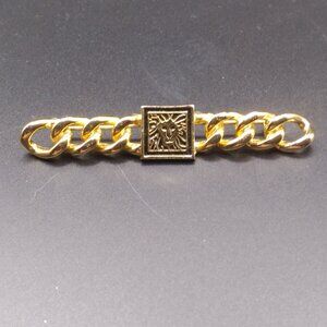 Gold tone Anne Klein Lion Bar Brooch